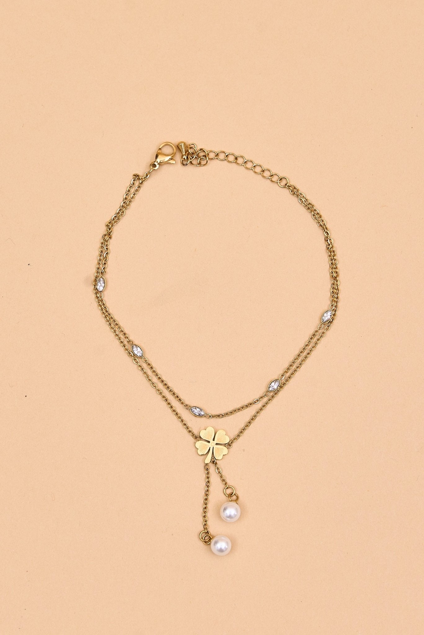 Gold bracelet with pearls and leaf clover charm. - Meiala Official