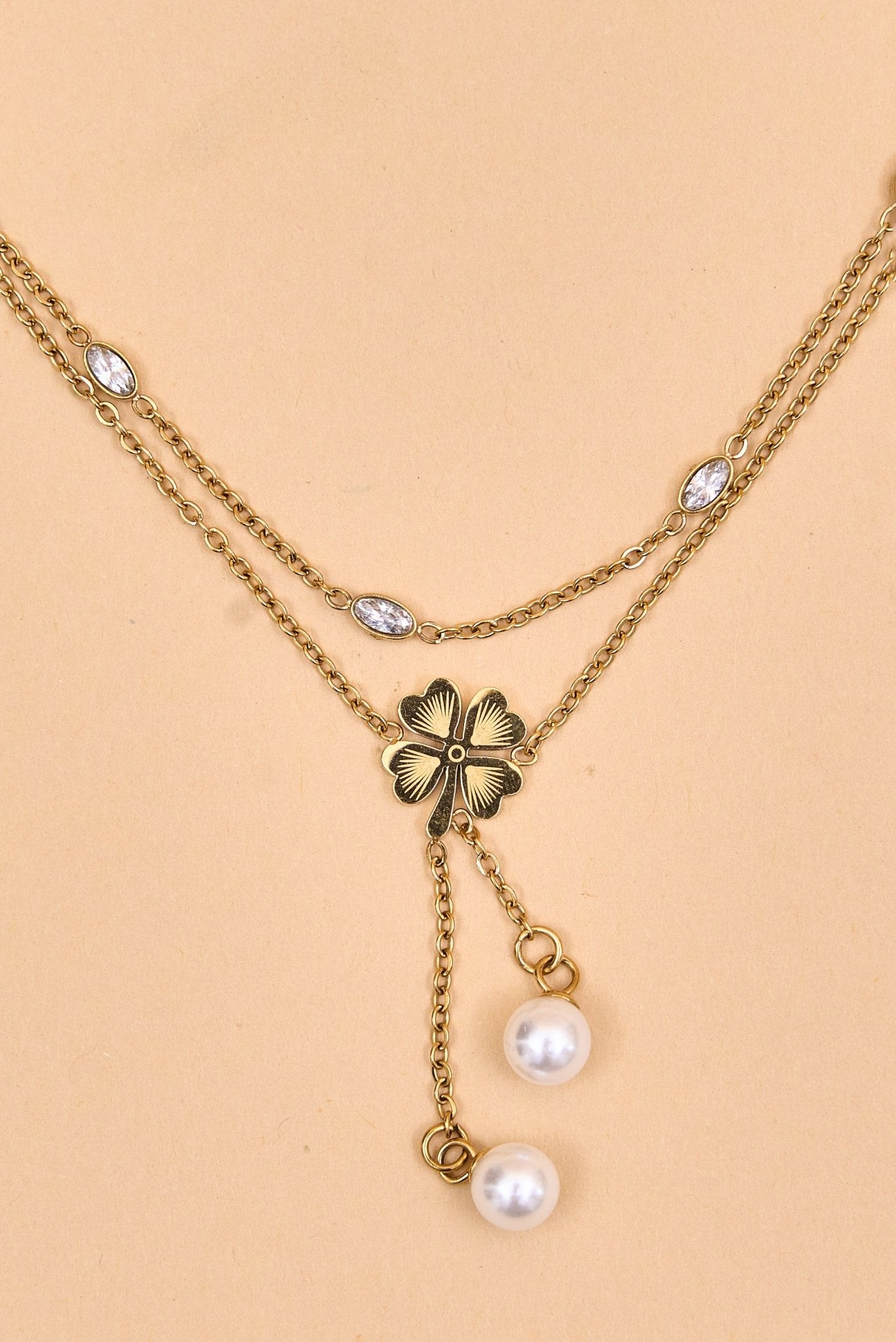 Gold bracelet with pearls and leaf clover charm. - Meiala Official