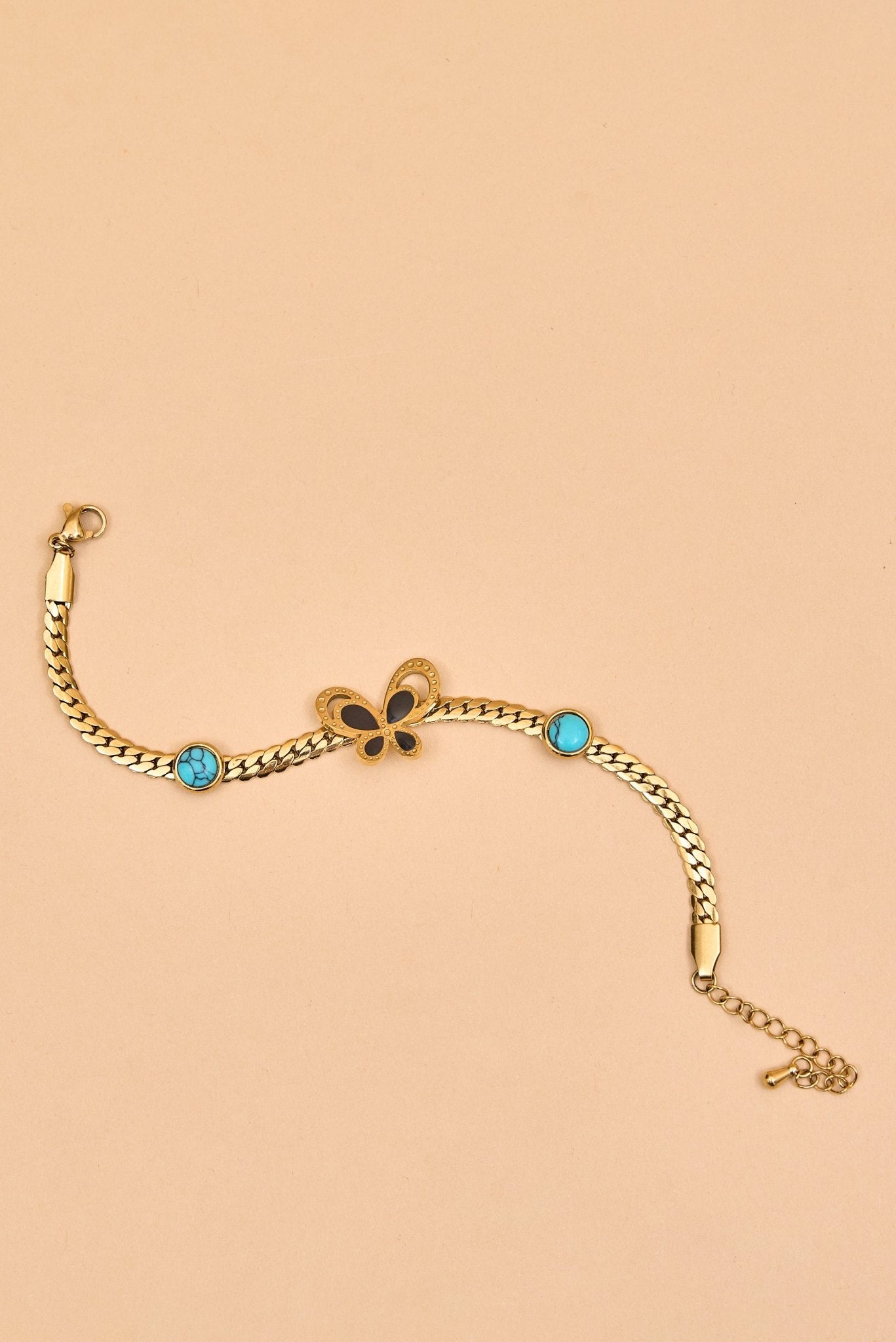Sleek gold bracelet with butterfly center charm. - Meiala Official